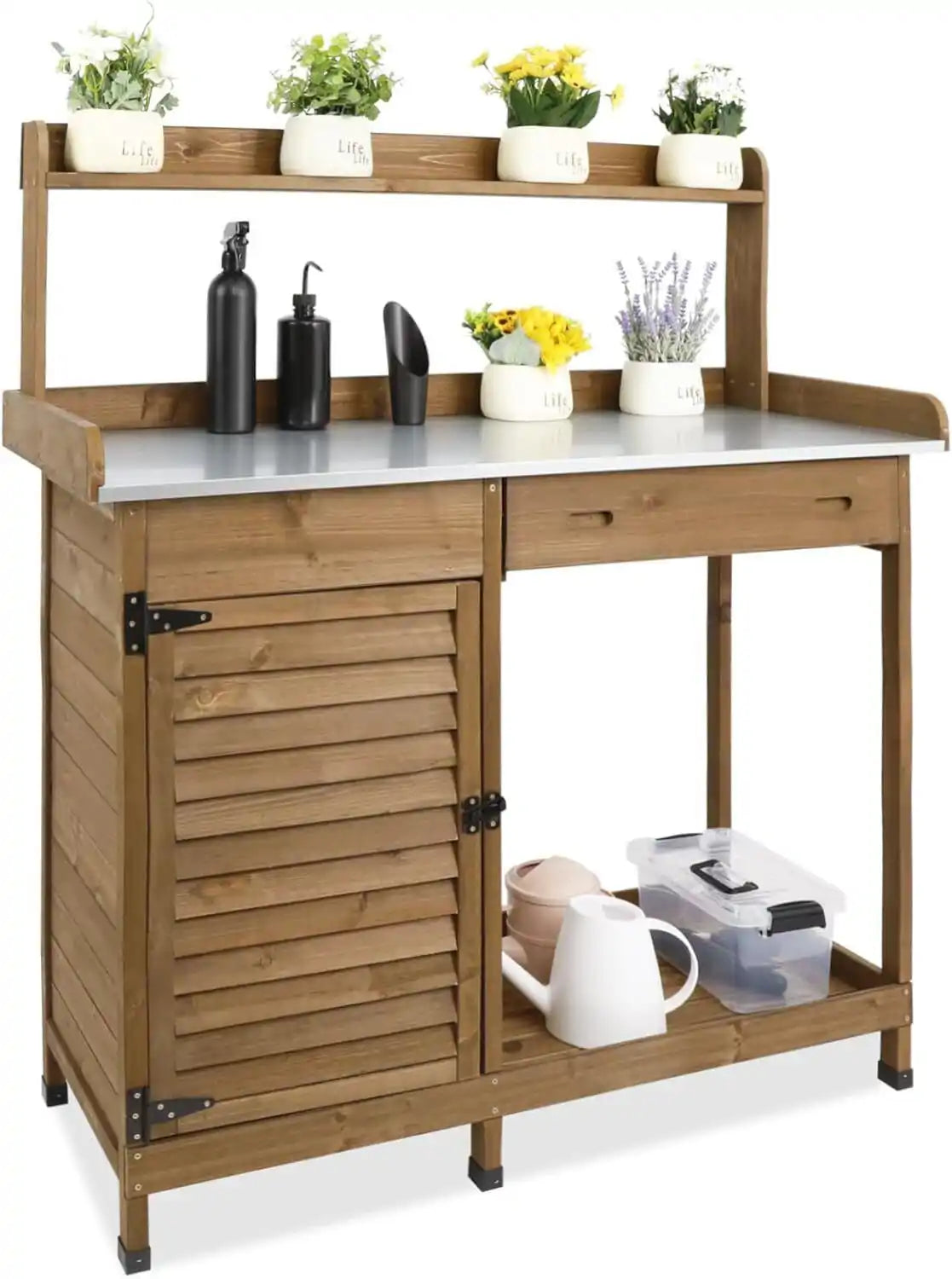 Potting bench with gardening tools and potted plants