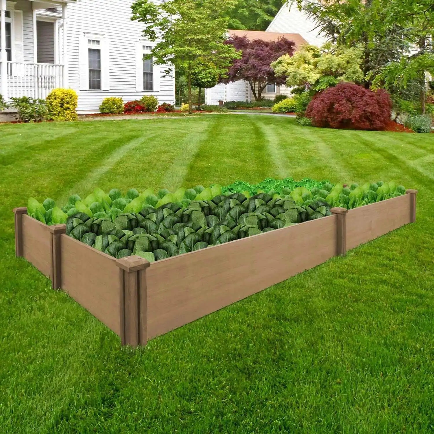 Large outdoor planter box assembled and filled with soil