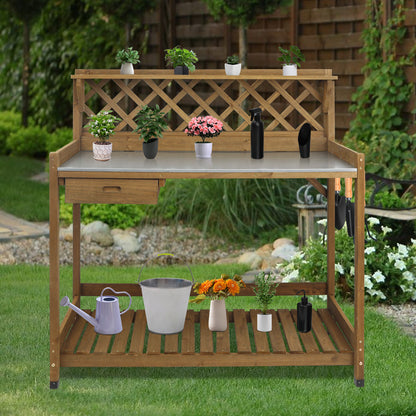 Outdoor potting table with drawer and bottom storage shelf